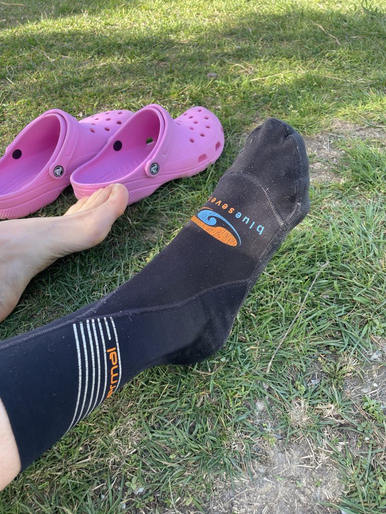 Pink Crocs clogs and swimming booties for open water swimming