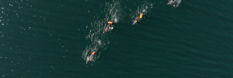 open water swimmers in Queenstown NZ viewed from above