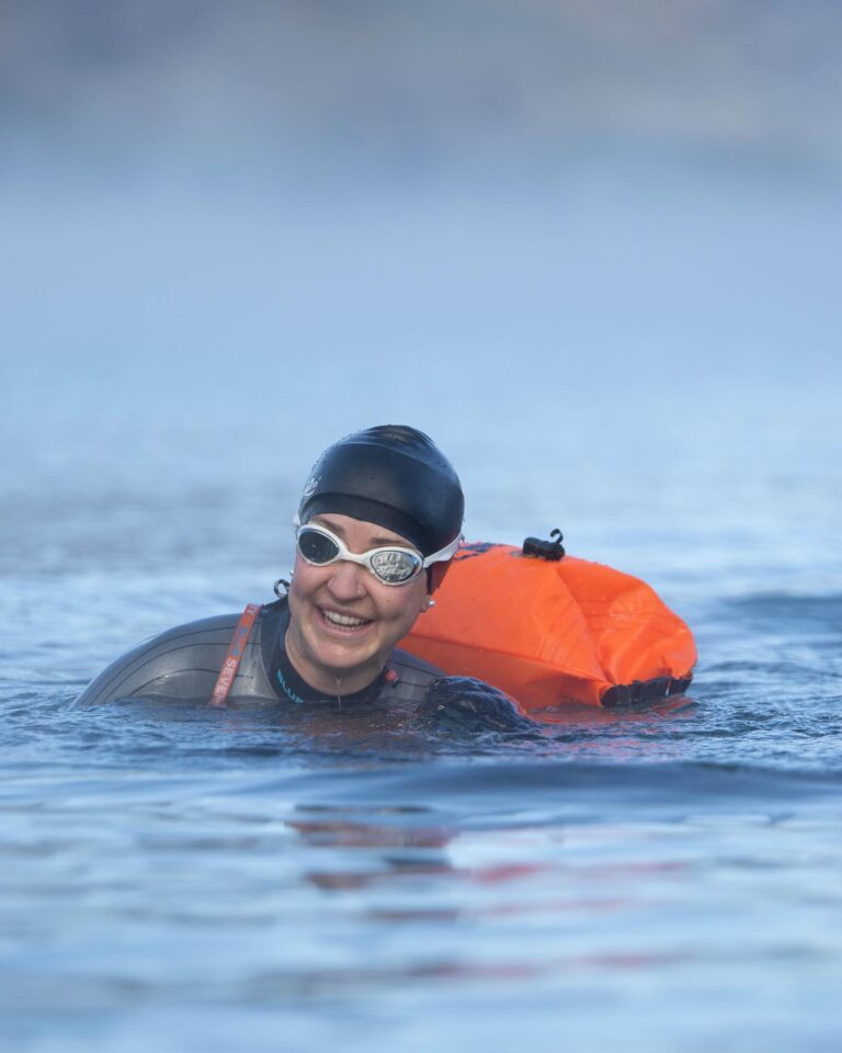 Open Water swimmer with tow float