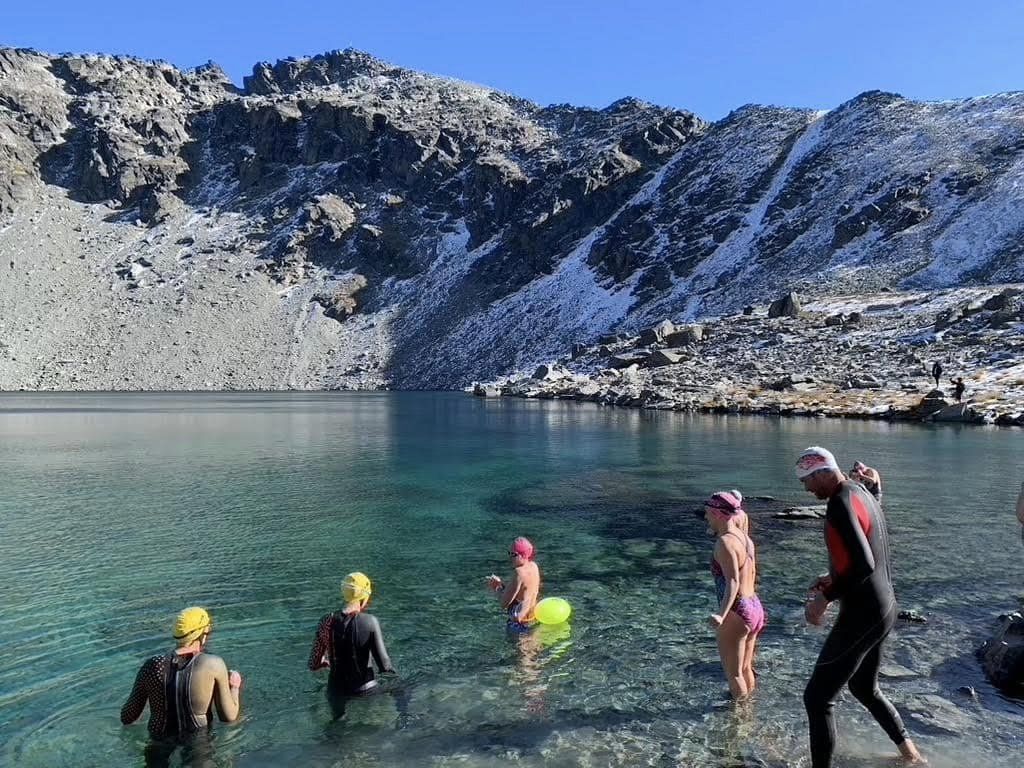 Swimmers getting into the chilly waters of Lake Alta, The Remarkable